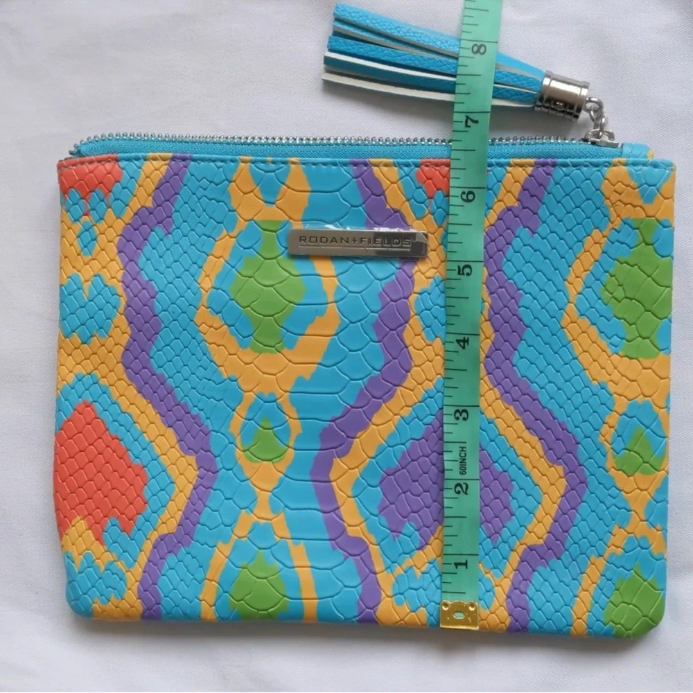 Rodan + Fields Clutch Set